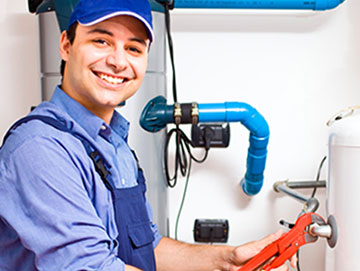 Plumber at a workbench